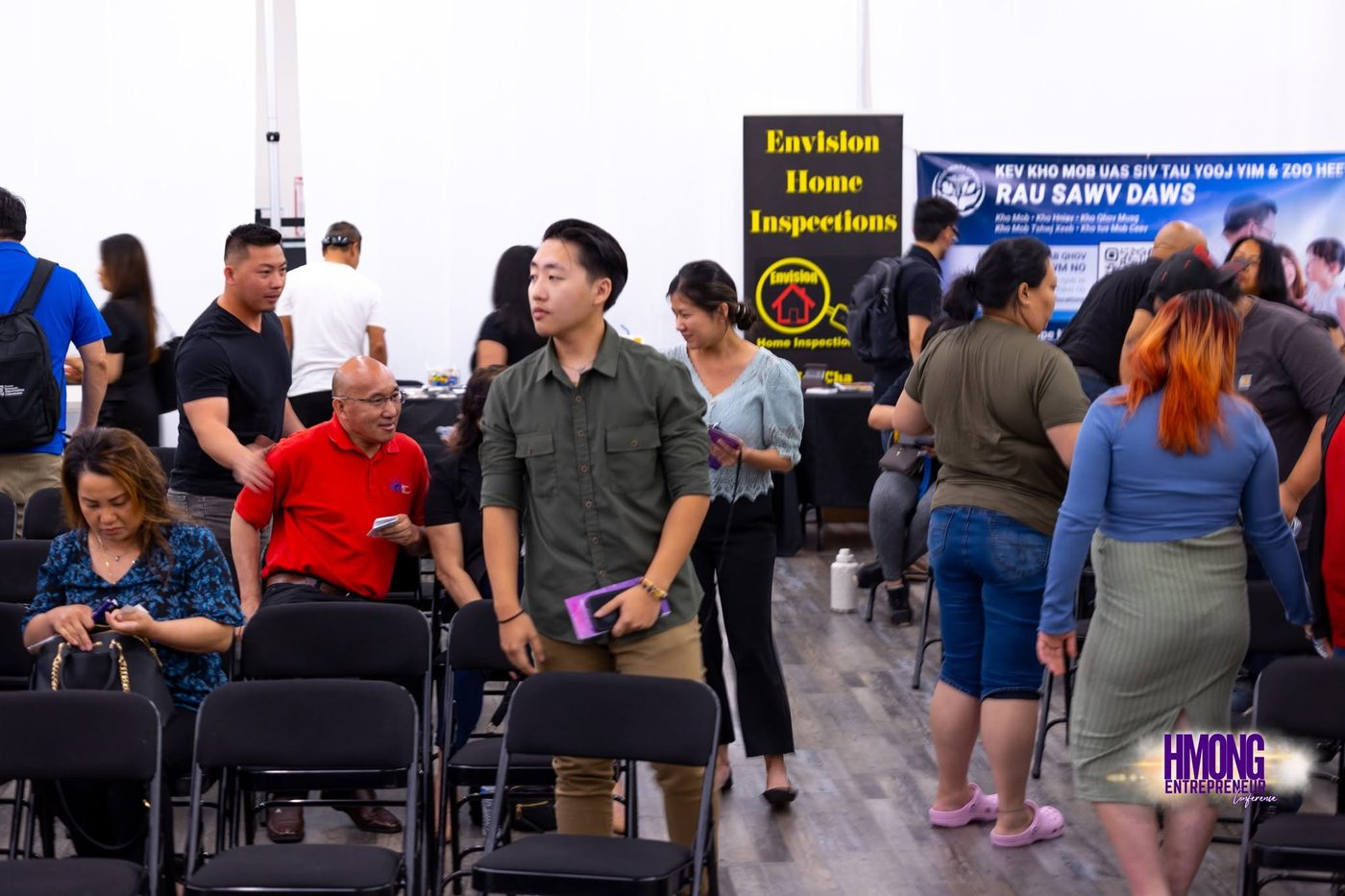Attendees networking at the Hmong Entrepreneur Conference in Fresno.